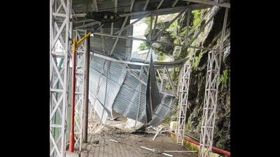 The collapsed structure on the Himkoti track to the Vaishno Devi shrine following a landslide in Reasi district on Monday. Two pilgrims were killed and one was injured in the incident. (PTI Photo) The collapsed structure on the Himkoti track to the Vaishno Devi shrine following a landslide in Reasi district on Monday. Two pilgrims were killed and one was injured in the incident. (PTI Photo)