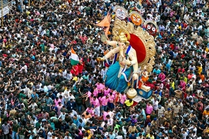 Devotees carry an idol Lord Ganesh ahead of the Ganesh Chaturthi festival, in Mumbai. (AFP) Devotees carry an idol Lord Ganesh ahead of the Ganesh Chaturthi festival, in Mumbai. (AFP)
