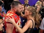 Kansas City Chiefs tight end Travis Kelce (87) speaks to Taylor Swift after the team's NFL Super Bowl 58 football game against the San Francisco 49ers, Feb. 11, 2024, in Las Vegas. A 170-year-old rivalry is flaring up as Kansas lawmakers try to snatch the Super Bowl champion Kansas City Chiefs away from Missouri. The team has international cache after three Super Bowl titles in five years and because of Kelce’s romance with pop icon Swift.