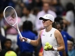 Poland's Iga Swiatek smiles after defeating Russia's Liudmila Samsonova