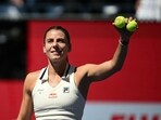 USA's Emma Navarro waves to the crowd after defeating Spain's Paula Badosa during their women's quarterfinals match on day nine of the US Open.