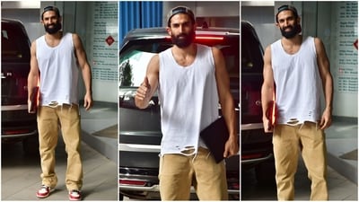 Aditya Roy Kapoor's recent casual look perfectly blends comfort with style. He opted for a sleeveless white T-shirt featuring a ribbed hemline, paired effortlessly with beige trousers. Completing the outfit with colour-blocked sneakers and a cap, he looked absolutely dapper. (HT photo/VarinderChawla) Aditya Roy Kapoor's recent casual look perfectly blends comfort with style. He opted for a sleeveless white T-shirt featuring a ribbed hemline, paired effortlessly with beige trousers. Completing the outfit with colour-blocked sneakers and a cap, he looked absolutely dapper. (HT photo/VarinderChawla)