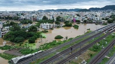 An aerial view of a partially submerged area after the Budameru Vagu River overflowed following heavy rainfall in Vijayawada. (ANI Photo)