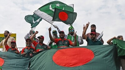 Bangladesh and Pakistan fans wave their national flags as they watch the fifth and final day of the second and last Test cricket match between Pakistan and Bangladesh, at the Rawalpindi Cricket Stadium in Rawalpindi. (AFP) Bangladesh and Pakistan fans wave their national flags as they watch the fifth and final day of the second and last Test cricket match between Pakistan and Bangladesh, at the Rawalpindi Cricket Stadium in Rawalpindi. (AFP)
