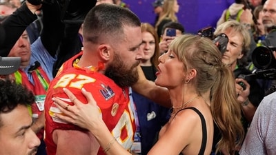 Kansas City Chiefs tight end Travis Kelce (87) speaks to Taylor Swift after the team's NFL Super Bowl 58 football game against the San Francisco 49ers, Feb. 11, 2024, in Las Vegas. A 170-year-old rivalry is flaring up as Kansas lawmakers try to snatch the Super Bowl champion Kansas City Chiefs away from Missouri. The team has international cache after three Super Bowl titles in five years and because of Kelce’s romance with pop icon Swift. (AP) Kansas City Chiefs tight end Travis Kelce (87) speaks to Taylor Swift after the team's NFL Super Bowl 58 football game against the San Francisco 49ers, Feb. 11, 2024, in Las Vegas. A 170-year-old rivalry is flaring up as Kansas lawmakers try to snatch the Super Bowl champion Kansas City Chiefs away from Missouri. The team has international cache after three Super Bowl titles in five years and because of Kelce’s romance with pop icon Swift. (AP)