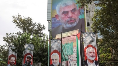 A billboard with a picture of newly appointed Hamas leader Yahya Sinwar is displayed on a building in a street in Tehran, Iran, August 12, 2024. Majid Asgaripour/WANA (West Asia News Agency) (via REUTERS)