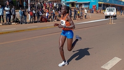Rebecca Cheptegei, competes at the Discovery 10km road race in Kapchorwa, Uganda Friday, Jan. 20, 2023. A Cheptegei, a Ugandan athlete living in Kenya was set ablaze by her boyfriend on Sunday Sept. 1, 2024 and is currently receiving treatment for 75% burns, police said. (AP) Rebecca Cheptegei, competes at the Discovery 10km road race in Kapchorwa, Uganda Friday, Jan. 20, 2023. A Cheptegei, a Ugandan athlete living in Kenya was set ablaze by her boyfriend on Sunday Sept. 1, 2024 and is currently receiving treatment for 75% burns, police said. (AP)