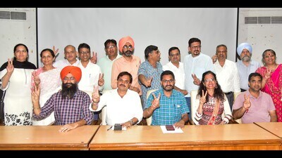 The newly elected members of the Panjab University Teachers’ Union after the declaration of results on Tuesday at Panjab University, Chandigarh. (HT Photo) The newly elected members of the Panjab University Teachers’ Union after the declaration of results on Tuesday at Panjab University, Chandigarh. (HT Photo)