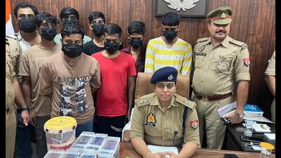 The police team also recovered 18 mobile phones, 4 laptops with chargers, QR codes, five SIM cards, two checkbooks, nine ATM cards, and other items from their possession. (Sourced) The police team also recovered 18 mobile phones, 4 laptops with chargers, QR codes, five SIM cards, two checkbooks, nine ATM cards, and other items from their possession. (Sourced)
