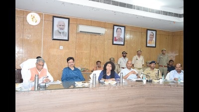 UP forest minister Dr Arun Kumar attending a meeting with Kheri district officials at the collectorate on Tuesday. (HT Photo)