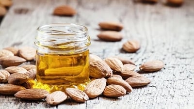 Almond oil massage: Almond oil is rich in vitamin E and has nourishing properties that help reduce dark circles and relax the eye muscles. Gently massage a few drops of warm almond oil around the eyes before bedtime. (Shutterstock) Almond oil massage: Almond oil is rich in vitamin E and has nourishing properties that help reduce dark circles and relax the eye muscles. Gently massage a few drops of warm almond oil around the eyes before bedtime. (Shutterstock)