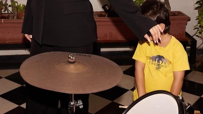 Kareena hid the face of Jeh in one picture, where he was seen playing with his drum set.&nbsp; 