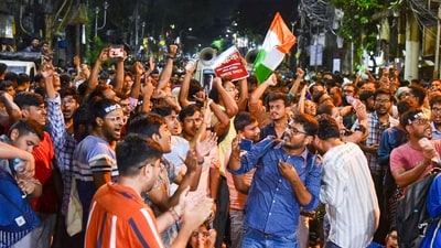 Kolkata doctor rape-muder case: Junior doctors celebrate after former principal of RG Kar Medical College and Hospital Sandip Ghosh was arrested by CBI. (PTI) Kolkata doctor rape-muder case: Junior doctors celebrate after former principal of RG Kar Medical College and Hospital Sandip Ghosh was arrested by CBI. (PTI)