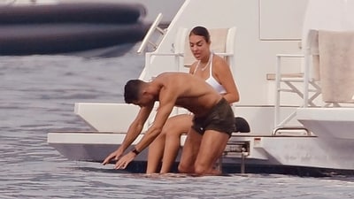 Ronaldo and Georgina took a dip in the French Riviera and demonstrated some strong PDA. In one such clip, Ronaldo, in dark swimming trunks, could be seen getting handsy with Georgina, cladded in a white-thong bikini. (Spread Pictures/Mega) Ronaldo and Georgina took a dip in the French Riviera and demonstrated some strong PDA. In one such clip, Ronaldo, in dark swimming trunks, could be seen getting handsy with Georgina, cladded in a white-thong bikini. (Spread Pictures/Mega)