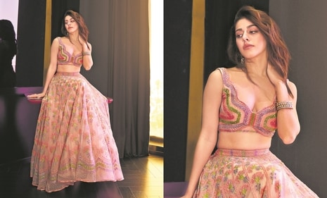 Alaya sets bridesmaid goals in a pink lehenga from Tuhina Srivastava’s Vaadiyan collection, complemented by elegant earrings from Q is by Ashmeet. The lehenga, intricately embroidered with shiny stones and glass embellishments, features over 400 floral motifs that bring the dreamy design to life. The pastel hues add a touch of freshness, making it a perfect choice for a daytime function. (Trisha Narang) Alaya sets bridesmaid goals in a pink lehenga from Tuhina Srivastava’s Vaadiyan collection, complemented by elegant earrings from Q is by Ashmeet. The lehenga, intricately embroidered with shiny stones and glass embellishments, features over 400 floral motifs that bring the dreamy design to life. The pastel hues add a touch of freshness, making it a perfect choice for a daytime function. (Trisha Narang)