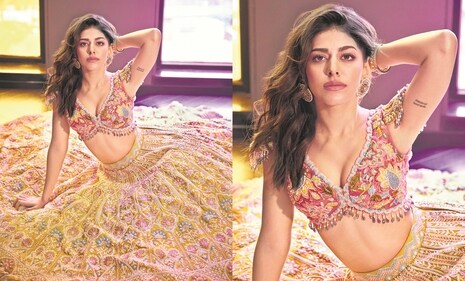 The actor exudes elegance in a stunning lehenga from Rianta’s by Rianta Chakraborty, paired with a beautifully crafted bangle from Ishhaara. This ensemble features intricate fusion embroidery with zardozi thread work and a pearl and crystal-embellished skirt, showcasing pure craftsmanship and creativity. Designed to balance opulence with delicacy, the lehenga appears soft and dainty despite its heavy craftsmanship, enhancing the bride’s look in every sense. (Trisha Narang) The actor exudes elegance in a stunning lehenga from Rianta’s by Rianta Chakraborty, paired with a beautifully crafted bangle from Ishhaara. This ensemble features intricate fusion embroidery with zardozi thread work and a pearl and crystal-embellished skirt, showcasing pure craftsmanship and creativity. Designed to balance opulence with delicacy, the lehenga appears soft and dainty despite its heavy craftsmanship, enhancing the bride’s look in every sense. (Trisha Narang)