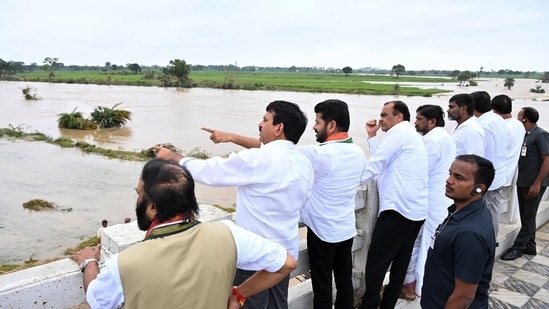 Telangana Chief Minister Revanth Reddy, along with ministers and officials, inspected the damaged Paleru Left Canal and damaged crop fields in Paleru on Monday. He will be visiting flood-affected areas in Mahabubabad district on Tuesday, the second day of his tour to rain-hit places. According to officials, Reddy stayed overnight in Khammam after visiting several places in the town accompanied by some of his cabinet colleagues, reported ANI.(ANI)
