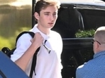 Barron Trump was escorted off to classes after visiting the dean's office at NYU, according to sources who spoke with The Post