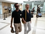 Caroline Darian and her brother Florian P arrive at the courthouse during the trial of their father, accused of drugging their mother for nearly ten years and inviting strangers to rape her. Caroline Darian and her brother Florian P arrive at the courthouse during the trial of their father, accused of drugging their mother for nearly ten years and inviting strangers to rape her.