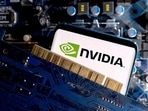 (Image for Ref) A smartphone with a displayed NVIDIA logo is placed on a computer motherboard in this illustration taken March 6, 2023. REUTERS/Dado Ruvic/Illustration/File Photo