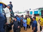Andhra Pradesh Chief Minister N Chandrababu Naidu interacts with affected people during his visit to the flood-affected areas, in Vijayawada on Tuesday, September 3. Andhra Pradesh Chief Minister N Chandrababu Naidu interacts with affected people during his visit to the flood-affected areas, in Vijayawada on Tuesday, September 3.
