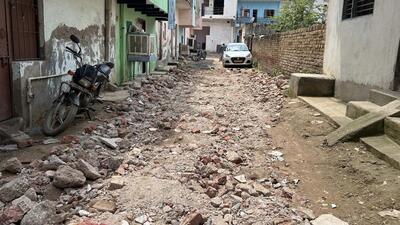 A broken street of Sheetla Colony Ward 9. (Parveen Kumar/HT) A broken street of Sheetla Colony Ward 9. (Parveen Kumar/HT)