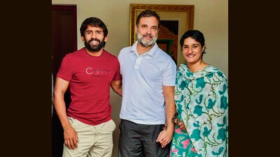Congress leader Rahul Gandhi with wrestlers Vinesh Phogat and Bajrang Punia in Delhi on Wednesday. (ANI) Congress leader Rahul Gandhi with wrestlers Vinesh Phogat and Bajrang Punia in Delhi on Wednesday. (ANI)