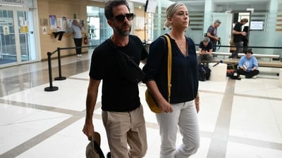 Caroline Darian and her brother Florian P arrive at the courthouse during the trial of their father, accused of drugging their mother for nearly ten years and inviting strangers to rape her. (AFP) Caroline Darian and her brother Florian P arrive at the courthouse during the trial of their father, accused of drugging their mother for nearly ten years and inviting strangers to rape her. (AFP)