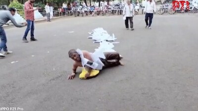 The image shows an MP man rolling with documents tied to him. The image shows an MP man rolling with documents tied to him.