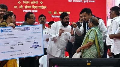 Mumbai, India. Sep 03, 2024: On Tuesday, Maharashtra Chief Minister Eknath Shinde presented a cheque to the beneficiaries of the Ramabai Nagar and Kamraj Nagar redevelopment project in Ghatkopar. This project involves the redevelopment of the Ramabai Ambedkar Nagar and Kamraj Nagar slums and is a collaborative effort between the SRA and government bodies. Mumbai, India. Sep 03, 2024. (Photo by Raju Shinde/HT Photo) (Hindustan Times) Mumbai, India. Sep 03, 2024: On Tuesday, Maharashtra Chief Minister Eknath Shinde presented a cheque to the beneficiaries of the Ramabai Nagar and Kamraj Nagar redevelopment project in Ghatkopar. This project involves the redevelopment of the Ramabai Ambedkar Nagar and Kamraj Nagar slums and is a collaborative effort between the SRA and government bodies. Mumbai, India. Sep 03, 2024. (Photo by Raju Shinde/HT Photo) (Hindustan Times)