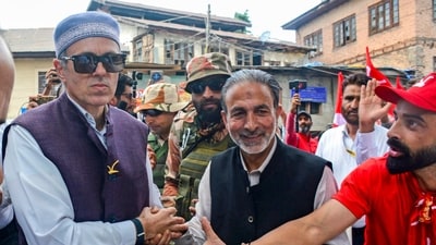 Jammu and Kashmir National Conference vice president Omar Abdullah being greeted by supporters upon his arrival to file nomination from Ganderbal. (PTI) Jammu and Kashmir National Conference vice president Omar Abdullah being greeted by supporters upon his arrival to file nomination from Ganderbal. (PTI)