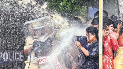 Police in Kochi rein in protesters demanding action against actors Mukesh and Siddique. (PTI) Police in Kochi rein in protesters demanding action against actors Mukesh and Siddique. (PTI)