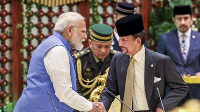 Prime Minister Narendra Modi with Sultan of Brunei Hassanal Bolkiah in Brunei on Wednesday. (PTI) Prime Minister Narendra Modi with Sultan of Brunei Hassanal Bolkiah in Brunei on Wednesday. (PTI)