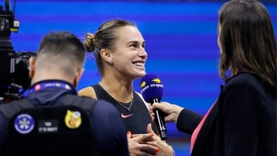 Belarus's Aryna Sabalenka is interviewed after winning her women's quarterfinals match against China's Zheng Qinwen (AFP) Belarus's Aryna Sabalenka is interviewed after winning her women's quarterfinals match against China's Zheng Qinwen (AFP)