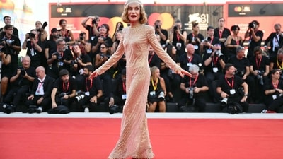 French actress and jury president Isabelle Huppert looked absolutely glamorous in a glittering silver gown on the red carpet. Her outfit, sparkling with shimmer, was truly stunning. (Photo by Alberto PIZZOLI / AFP)