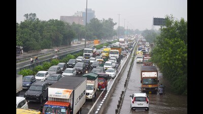Traffic congestion on National Highway-48 due to waterlogging on main carriageway during heavy rains near Narsinghpur village, in Gurugram on Wednesday. (HT PHOTO) Traffic congestion on National Highway-48 due to waterlogging on main carriageway during heavy rains near Narsinghpur village, in Gurugram on Wednesday. (HT PHOTO)