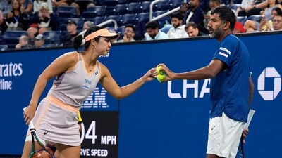 Rohan Bopanna, of India, right, with partner Aldila Sutjiadi of Indonesia (AP)