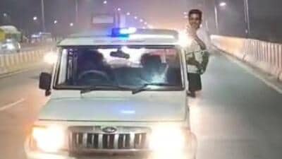 Videos of the Bolero speeding on the highway with the beacon light on and siren blaring was widely shared on social media. (HT Photo) Videos of the Bolero speeding on the highway with the beacon light on and siren blaring was widely shared on social media. (HT Photo)