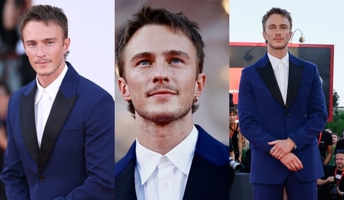 Drew looks dapper in a navy blue suit at the premiere of his movie Queer at Venice Film Festival 2024.