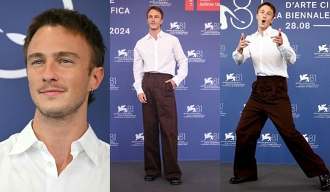 Drew Starky looks spiffy in a button down shirt paired with pleated trousers.