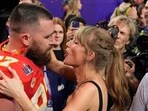 Kansas City Chiefs tight end Travis Kelce (87) speaks to Taylor Swift after the team's NFL Super Bowl 58 football game 