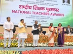 President Droupadi Murmu, Union Education Minister Dharmendra Pradhan, Union Ministers of State for Education Jayant Chaudhary and Sukanta Majumdar felicitate a teacher during the National Teachers Awards. (PTI Photo) President Droupadi Murmu, Union Education Minister Dharmendra Pradhan, Union Ministers of State for Education Jayant Chaudhary and Sukanta Majumdar felicitate a teacher during the National Teachers Awards. (PTI Photo)