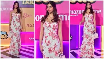 Suhana Khan embraced florals in a lovely dress featuring spaghetti straps and a ruffled neckline. She paired it with a matching Louis Vuitton bag and glowing makeup to complete her chic look. (HT Photo/VarinderChawla) Suhana Khan embraced florals in a lovely dress featuring spaghetti straps and a ruffled neckline. She paired it with a matching Louis Vuitton bag and glowing makeup to complete her chic look. (HT Photo/VarinderChawla)