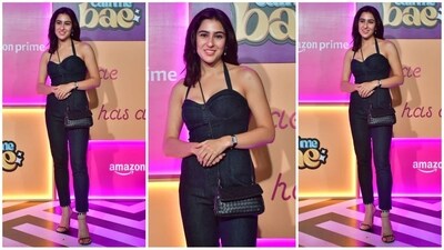 Sara Ali Khan slayed in a denim jumpsuit featuring a halter neckline and backless design. She accessorised with a black sling bag, high heels, and dewy makeup, looking effortlessly stylish. (HT Photo/VarinderChawla) Sara Ali Khan slayed in a denim jumpsuit featuring a halter neckline and backless design. She accessorised with a black sling bag, high heels, and dewy makeup, looking effortlessly stylish. (HT Photo/VarinderChawla)