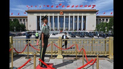 A Chinese paramilitary policeman stands guard outside the Great Hall of the People during the Forum China-Africa Cooperation (FOCAC) summit in Beijing on September 5, 2024. (Photo by Adek BERRY and ADEK BERRY / POOL / AFP) (AFP) A Chinese paramilitary policeman stands guard outside the Great Hall of the People during the Forum China-Africa Cooperation (FOCAC) summit in Beijing on September 5, 2024. (Photo by Adek BERRY and ADEK BERRY / POOL / AFP) (AFP)