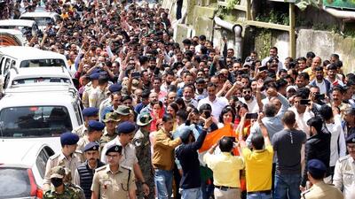 A large number of people gathered outside the Sanjauli Masjid in Shimla to protest against the alleged illegal construction of the mosque. (Deepak Sansta/HT)