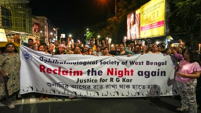 People during a candlelight march. Reclaim the night march seemed to have returned to the streets of Kolkata for the second time. (PTI) People during a candlelight march. Reclaim the night march seemed to have returned to the streets of Kolkata for the second time. (PTI)
