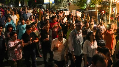 People during a candlelight march in protest against the alleged rape and murder of a trainee woman doctor at the RG Kar Medical College and Hospital, in Kolkata on Wednesday, (PTI) People during a candlelight march in protest against the alleged rape and murder of a trainee woman doctor at the RG Kar Medical College and Hospital, in Kolkata on Wednesday, (PTI)