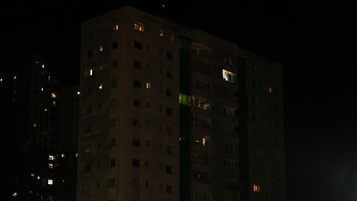 The lights of a residential building are seen turned off in response to call by junior doctors to light a diya as protest against rape and murder of female doctor in Kolkata. (PTI) The lights of a residential building are seen turned off in response to call by junior doctors to light a diya as protest against rape and murder of female doctor in Kolkata. (PTI)