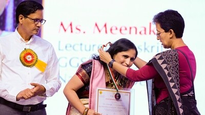 Delhi Education Minister Atishi presents the Teacher Award at a function on Teachers' Day in New Delhi on Thursday. (PTI Photo/Vijay Verma) Delhi Education Minister Atishi presents the Teacher Award at a function on Teachers' Day in New Delhi on Thursday. (PTI Photo/Vijay Verma)